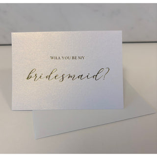 Elegant 'Will You Be My Bridesmaid' card with gold foil lettering and matching envelope