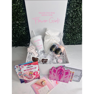 Personalized white gift box with pink shredded tissue, designed for flower girls, featuring customizable name and message options.