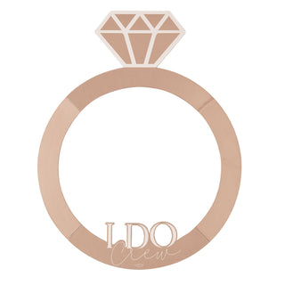 Rose gold ring-shaped photo booth frame with â€œI Do Crewâ€ text, measuring 74cm x 59cm, ideal for hen party photos.