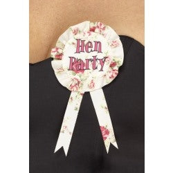 Cream-colored rosette with pink floral design and "Hen Party" text, featuring ribbon tails