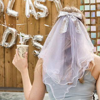 Fabulous glitter bow veil designed for the bride-to-be, ideal for last disco-themed hen parties