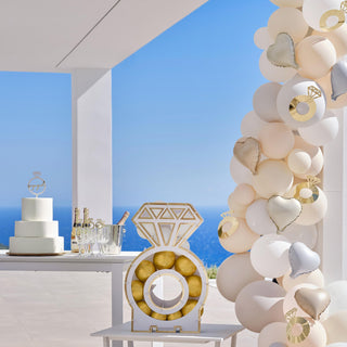 Wooden engagement ring cake topper with silver ring base and gold 'Engaged' script â€“ ideal for wedding cakes