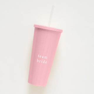 Reusable pink cup with 'Team Bride' text and matching pink straw, ideal for hen party drinks