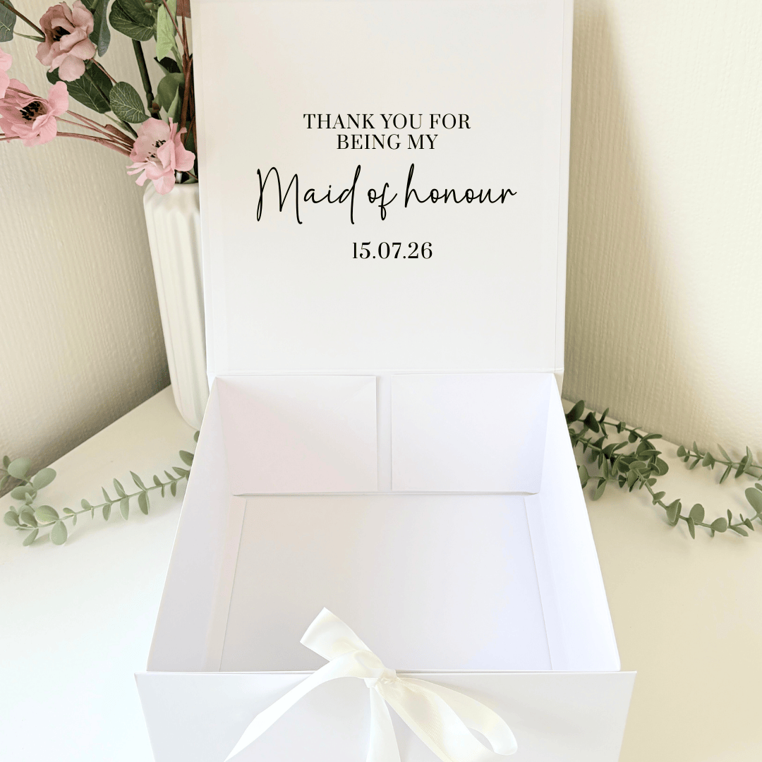 white box with ribbon tie