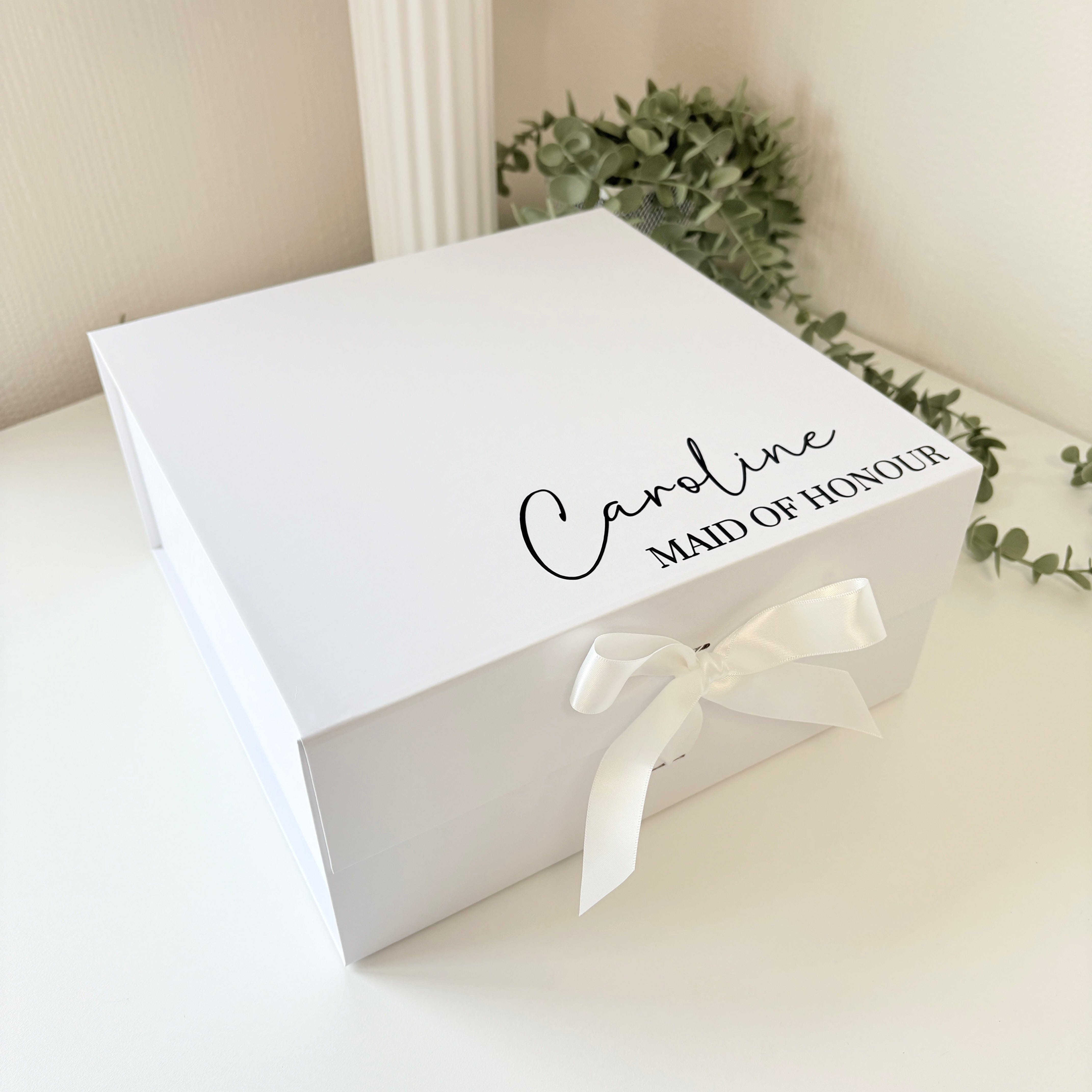 white box with ribbon tie