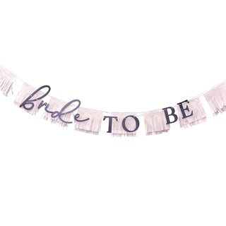 'Bride To Be' bunting with elegant lettering and tassel garland, ideal for hen party decorations.