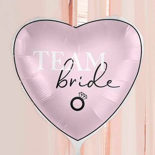 Pink heart-shaped foil balloon with 'Team Bride' lettering, ideal for hen party decorations.
